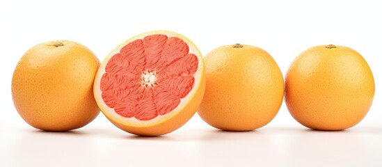Poster - Copy space image of vibrant grapefruits against a pristine white backdrop