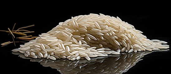 Aufkleber - An isolated copy space image of rice set against a black background