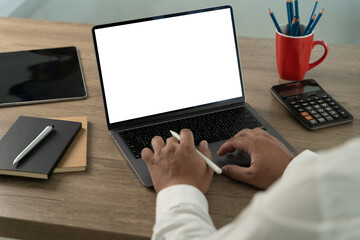 Fototapete - closeup view businessman analyze hand typing laptop computer with blank screen business online, e co