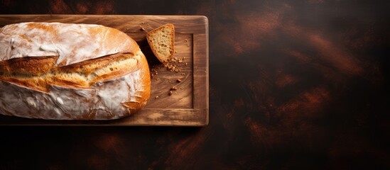 Poster - A copy space image featuring a flatlay of freshly baked homemade bread on a wooden board