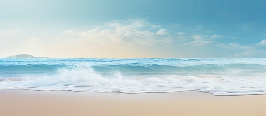 Poster - A gentle wave brushes against the sandy shore creating a serene summer background with enough room for a message. Creative banner. Copyspace image