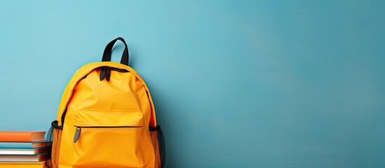 Wall Mural - School bag with school supplies on a background Ample space available for adding text