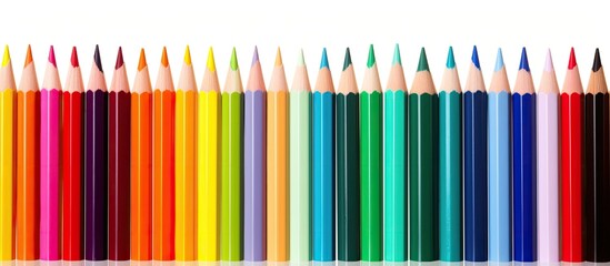 Aufkleber - Colorful pencils create a blurred pattern isolated on a white background providing ample copy space image