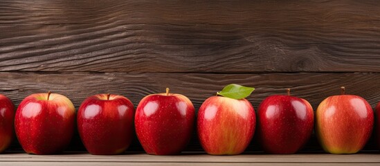 Canvas Print - Copy space image of red apples on a wooden background