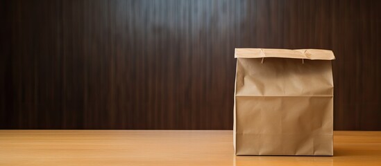 Poster - A plain brown paper bag for lunch or food on a table with ample space for writing or images