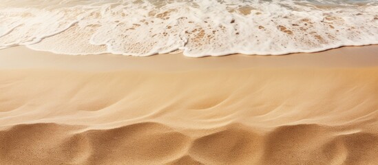 Poster - A sandy beach with its textured sand is the perfect background for a copy space image