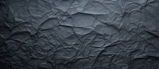 Aufkleber - The dark paper with a creased texture serves as the background for the copy space image