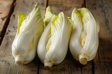 Canvas Print - Bunch of fresh endives on wood