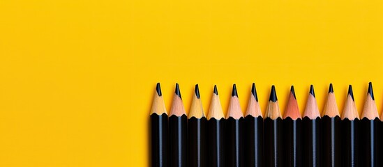 Aufkleber - A black pencil is used to write the phrase CONFLICT OF INTEREST on a yellow background creating a copy space image