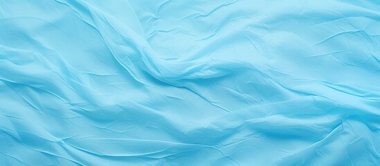 Poster - A copy space image of a textured background in a light blue cyan shade perfect for graphic design purposes