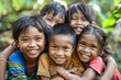 © Inigo - Portrait of asian children smiling and looking at the camera.