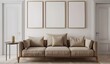© lemya - A beige sofa in a minimalistic interior with three blank picture frames on a white wall mockup