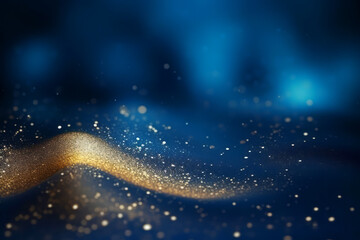 Wall Mural - golden abstract bokeh on blue background. celebrating christmas, new year or other holidays.