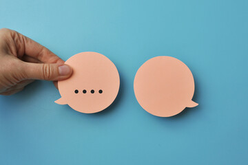 Poster - Two conversational clouds. Symbol of the need to write, ask something