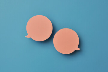Poster - Two conversational clouds. Symbol of the need to write, ask something