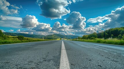 Poster - Long empty road stretching into the horizon, perfect for travel or transportation concepts