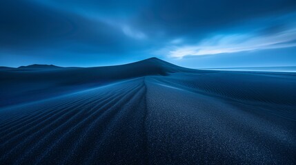 Capturing the striking contrast of black sand dune