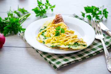 Wall Mural - fried omelette stuffed with herbs, parsley, dill