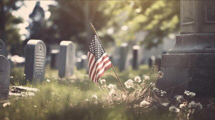 Wall Mural - American flag on a grave in the cemetery. Selective focus.