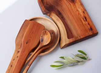 Wooden kitchen utensils stacked view, spoon and spatula