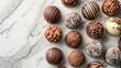 © Aliaksandra - luxurious chocolate truffles on elegant marble surface for world chocolate day design, ideal for adding text accompaniment