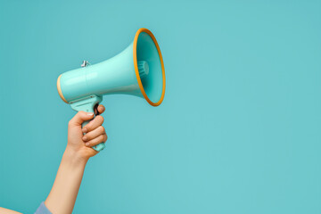 Woman Holding Megaphone on blue background