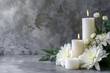 © Running opossum - Somber condolence background featuring lit white candles amid fresh white chrysanthemums on a textured gray backdrop
