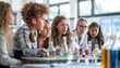 © Kateryna - a telephoto shot capturing students engaged in a classroom discussion, with the teacher facilitating and providing insights, Students, teachers, science projects, homework, with co