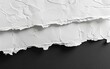 © Mark - Rough-textured white paper with torn edges against a black background.