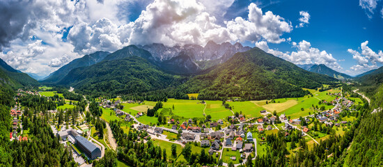 Wall Mural - Gozd Martuljek town in Slovenia at summer with beautiful nature and mountains in the background. View of mountain landscape next to Gozd Martuljek in Slovenia, view from the top of Gozd Martuljek.