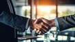 © Nayyab - Successful business merger: two businessmen shake hands in celebration of partnership and deal.