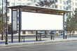 © forenna - mockup of blank white horizontal billboard on the side of an outdoor bus stop, daylight city background, photorealistic commercial photo