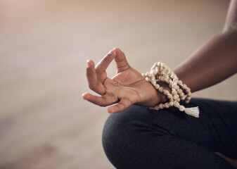 Wall Mural - Hand, person and bracelet with gyan mudra in yoga class for zen, meditation and chakra in studio. Woman, harmony and sitting on floor for peace, calmness and concentration for healthcare or wellbeing