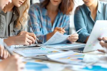 Poster - Group of business individuals working together on a project with laptop and financial papers
