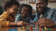 © G.Go - LGBTQ parents and their children playing a board game in the living room