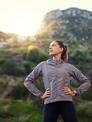 Wall Mural - Fitness, confidence and woman thinking in nature for health, wellness or ready to race, workout or exercise. Sports person or runner with vision for training or journey with hands on hip on mountains