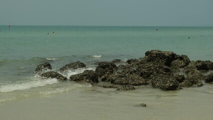 Wall Mural - sand and stones on the seashore