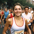 © TheLion - Young Athelete Girl Running race on a track Marathon runner happy winner face celebration