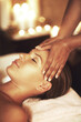 © peopleimages.com - Hands, girl and head massage at spa for wellness, health or relax for hospitality at resort. Masseuse, client and care for scalp, headache treatment and physical therapy for healing at luxury salon