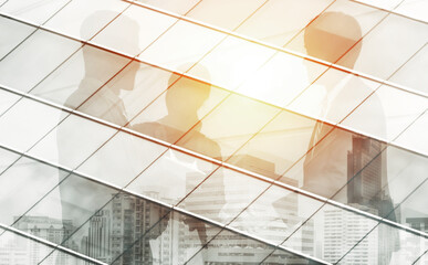 Wall Mural - double exposure image of faded business abstract background with office building and people conferen