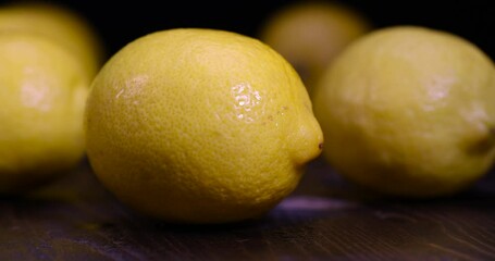 Canvas Print - ripe yellow lemon on a blackboard, ripe lemon on a black background