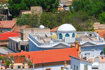 Wall Mural - View of the old town with tiled roofs and cupola on the rooftop