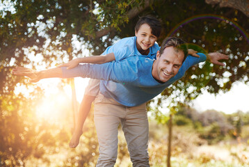 Canvas Print - Portrait, dad and happy kid with airplane game at park for love, care or family bonding together in nature. Smile, father and piggyback child for support, flare and play on summer holiday for freedom