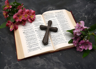 Holy Bible with a Cross