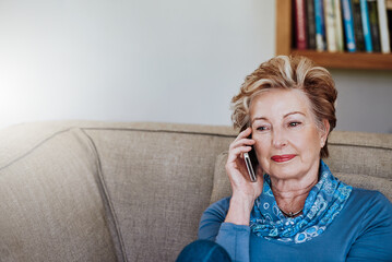 Poster - Phone call, relax and thinking with senior woman on sofa in living room of retirement home for communication. Conversation, flare and mobile with elderly person in apartment for chatting or talking