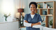 © peopleimages.com - Happy, confident or nurse in healthcare, clinic or support as wellness, medicine or service. Woman, health professional or arms crossed in pride, joy or ambition at at specialist medical career