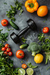 © Emanuel - Fresh ingredients and a dumbbell, representing the synergy between healthy food choices and regular exercise for a balanced lifestyle