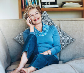 Poster - Sofa, smile and elderly woman with phone call in living room for contact, communication and connection. Happy, retirement and relax with technology at home for digital consulting, idea and discussion
