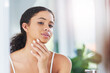 © peopleimages.com - Morning, bathroom and woman with skincare results after facial treatment, acne management and check. Home, female model and face with benefits from cosmetics, collagen and satisfied with beauty
