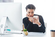 © peopleimages.com - Woman, employee and sad on smartphone at office in desk for social media post, bad news or cyber bullying. Female person, computer and disappointed with application, email and communication error